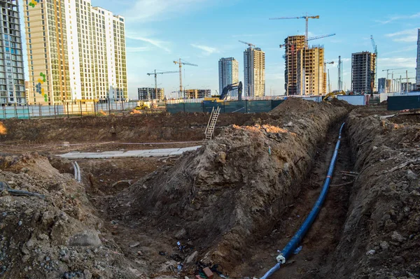 Construction of underground communications at hazardous chemical production. removal of acids, plant waste. creating a runoff to protect groundwater from pollution — Stock Image Construction of underground communications at hazardous chemical production. removal of acids, plant waste. creating a runoff to protect groundwater from pollution Stock Picture