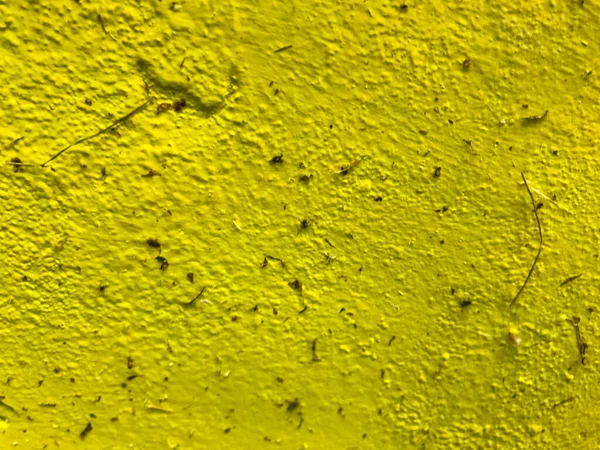 natural texture. painted background in yellow. heterogeneous, porous, volumetric texture. painted over rust. bright colored metal. natural texture