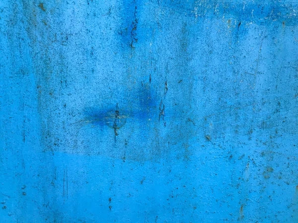 Υφή, μπλε χρώμα. Σκουριά, ζημιά στο μεταλλικό φύλλο. Καλύμματα σπιτιών, πάγκοι. μπλε βαμμένη μεταλλική επιφάνεια. γρατσουνιές από μεταλλικό φύλλο, κοψίματα. κομψή σχεδίαση επιφάνειας — Φωτογραφία Αρχείου