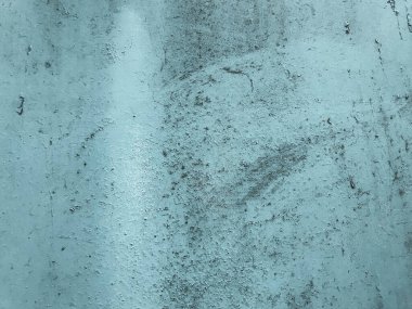 Turkuaz rengi, gri. Parlak, sıra dışı renkte bir mat yüzeyi. Boya lekeli metal levha, hasar, aşınma. Duvar dekorasyonu, tasarım yenileme, dekorasyon elementlerinin dekorasyonu, konfor yaratma