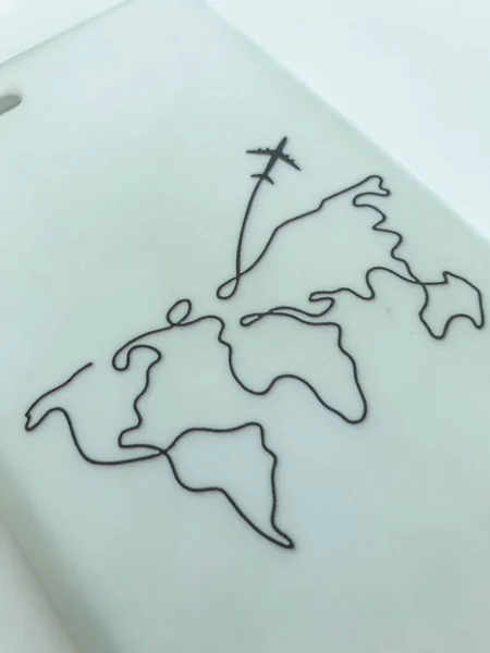 white matte phone case with world map. the plane flies to another continent. black thick lines on the material. rubber texture, smooth homogeneous structure