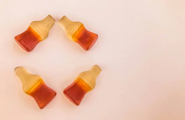 the letter o from marmalade in the form of bottles with lemonade. creative letter. gummy words. unusual inscription. delicious and sweet letter. word from food. edible alphabet