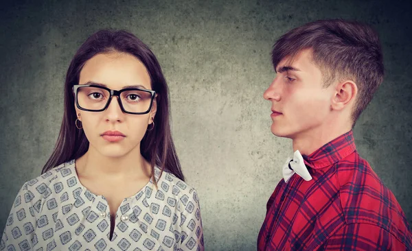 Young Serious Woman Glasses Looking Camera While Standing Man Having — Stock Photo, Image