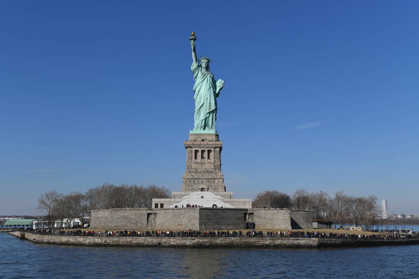 Statue of Liberty. The Statue of Liberty (Liberty Enlightening the World; French: La Libert clairant le monde) is a colossal neoclassical sculpture on Liberty Island in New York Harbor in New York, in the United States.