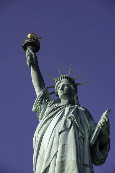 Statue of Liberty. The Statue of Liberty (Liberty Enlightening the World; French: La Libert clairant le monde) is a colossal neoclassical sculpture on Liberty Island in New York Harbor in New York, in the United States.
