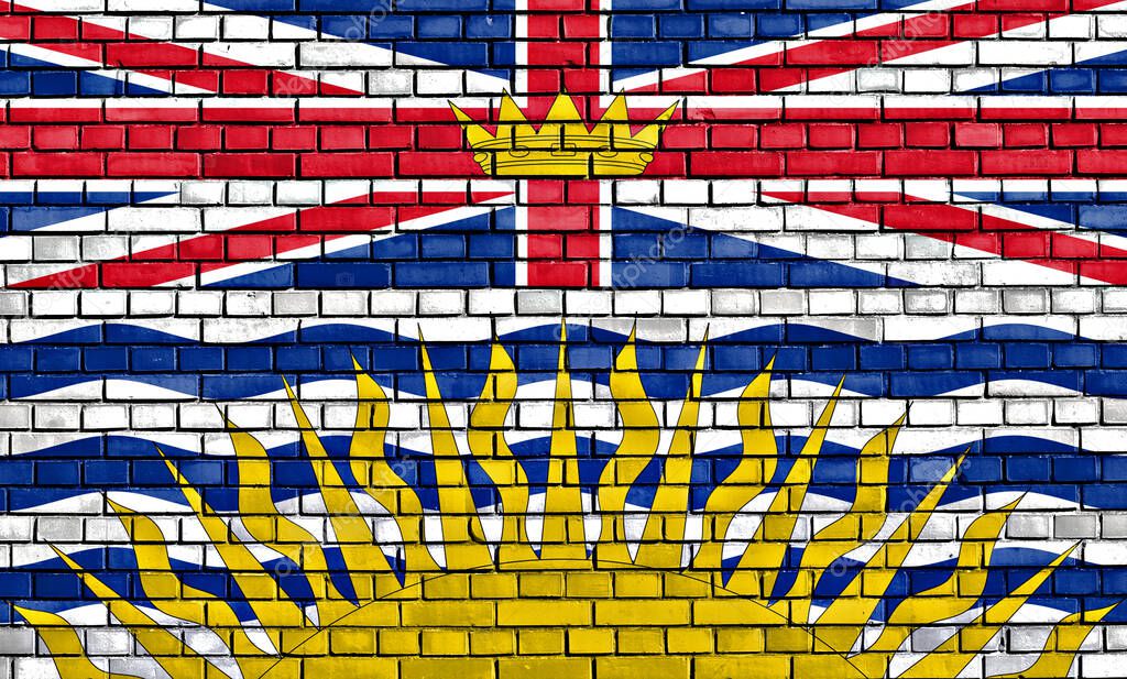 flag of British Columbia painted on brick wall
