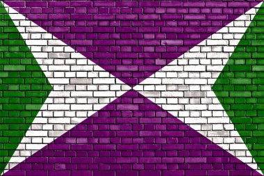 Tuğla duvarda Yabucoa bayrağı