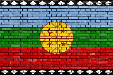 flag of Mapuche painted on brick wall clipart