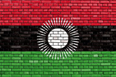 Malawi 'nin bayrağı tuğla duvara boyanmış.