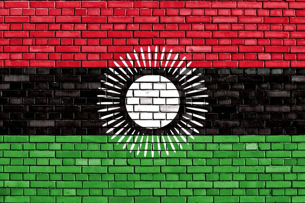 Malawi 'nin bayrağı tuğla duvara boyanmış.