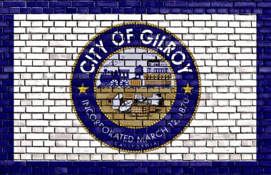 Tuğla duvara Gilroy bayrağı