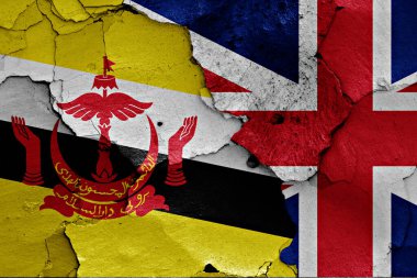 Kırık duvarda Brunei ve İngiltere bayrakları