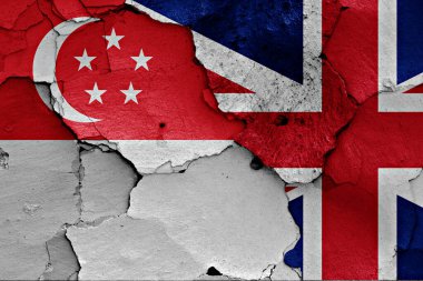 Kırık duvarda Singapur ve İngiltere bayrakları