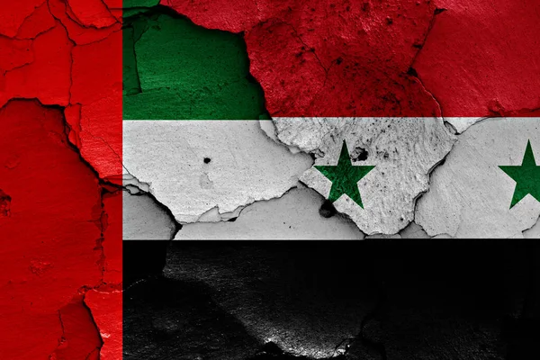 Flaggor Förenade Arabemiraten Och Syrien Målade Spruckna Väggar — Stockfoto
