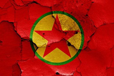 flag of PKK painted on cracked wall clipart