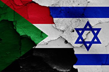 Kırık duvarda Sudan ve İsrail bayrakları