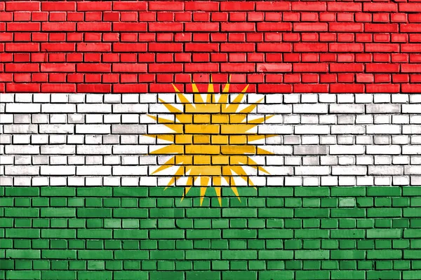 Флаг Курдистана Раскрашенный Кирпичной Стене — стоковое фото