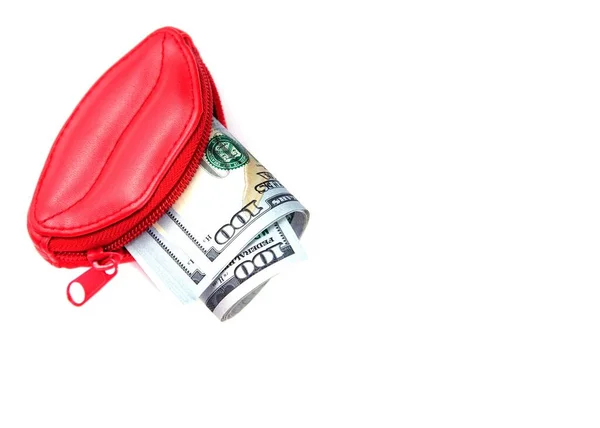 Love for money. Red purse in form of lips and banknotes of one hundred dollars. Women\'s salary. Selling love. Copy space