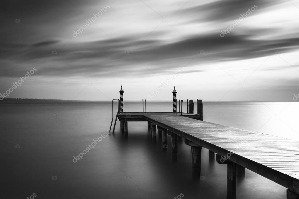Jetty at lake Gardasee in Italy, Europe