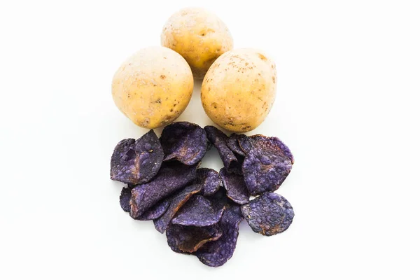 Heap of purple potato chips on white background — Stock Photo, Image