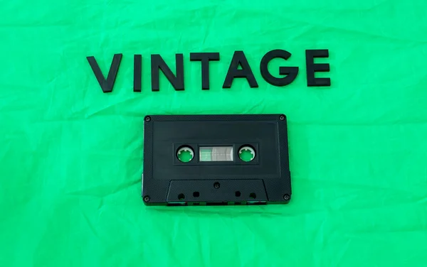 Vista Superior Vintage Palabra Letras Negras Con Viejo Cassette Negro —  Fotos de Stock