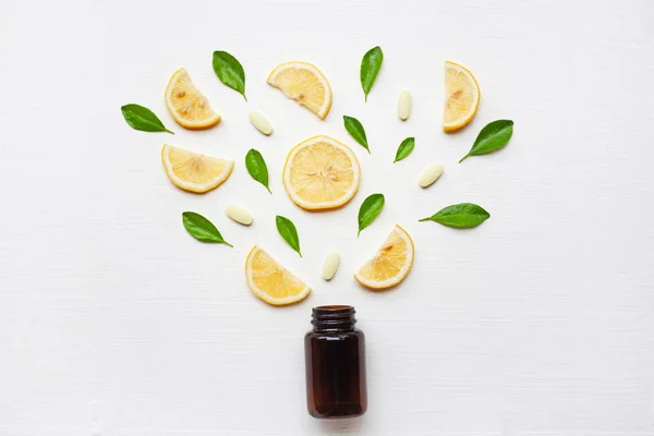 Empty Medicine Bottle Fresh Lemon Leaves Vitamin White Background — Stock Photo, Image