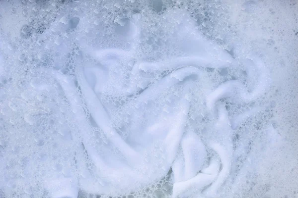 Soak a cloth before washing, white cloth