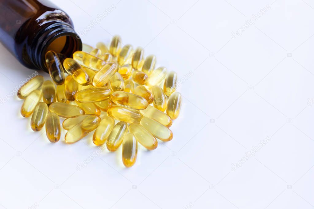 Fish oil capsules on white