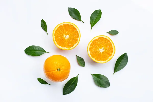 Top view of orange fruits and leaves isolated on white background.