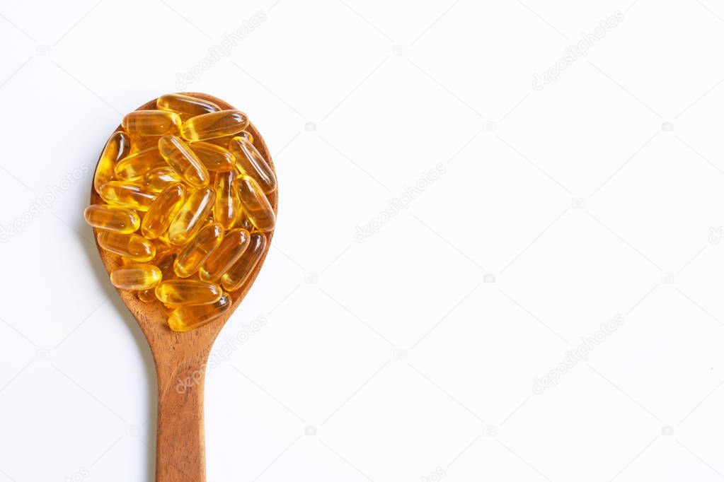 Fish oil capsules on white