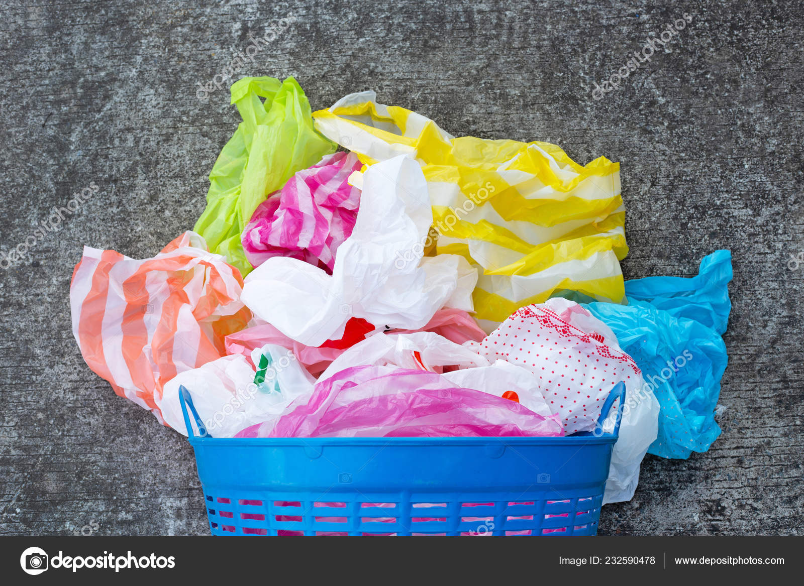 Colorful Plastic Bags Trash Basket Cement Floor Background Stock