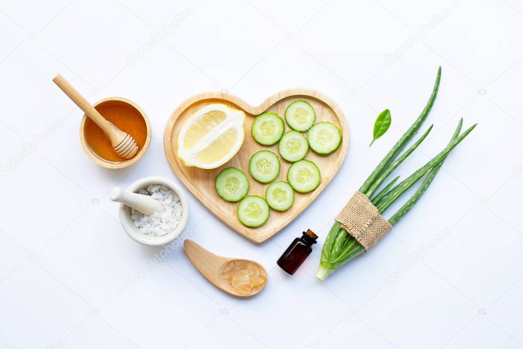 Natural ingredients for homemade skin care on white.