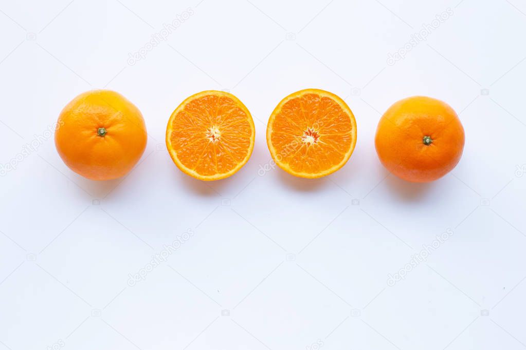Fresh orange citrus fruit on white.