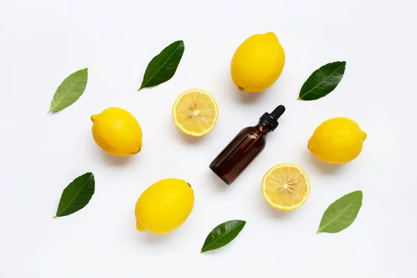 Fresh lemon with lemon essential oil on white background. — Stock Photo, Image