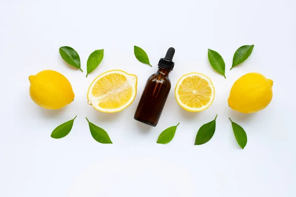 Fresh lemon with lemon essential oil on a white. — Stock Photo, Image