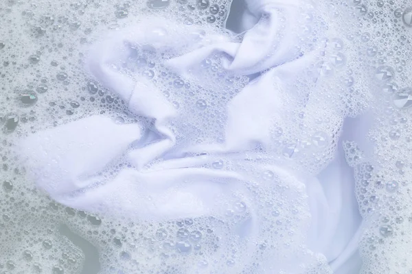 Soak a cloth before washing, white cloth — Stock Photo, Image