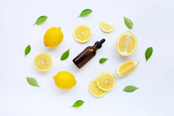 Fresh lemon with lemon essential oil on  white background. — Stock Photo, Image