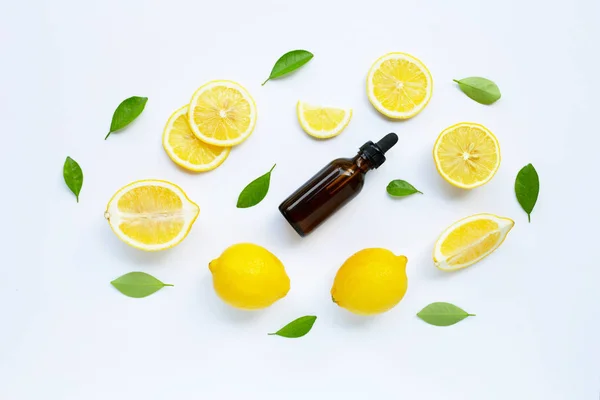 Fresh lemon with lemon essential oil on  white background. — Stock Photo, Image