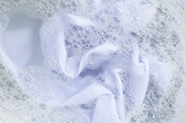 Remojar un paño antes de lavar, paño blanco — Foto de Stock