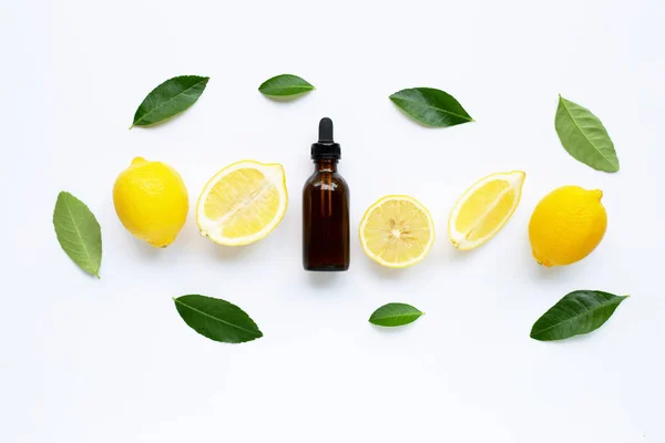 Fresh lemon with lemon essential oil on  white background. — Stock Photo, Image