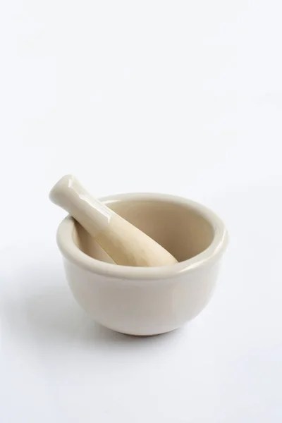 Mortar and pestle on white — Stock Photo, Image