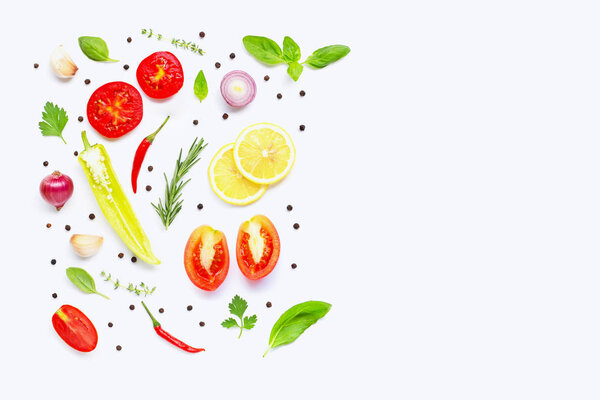 Various fresh vegetables and herbs on white background. Healthy 