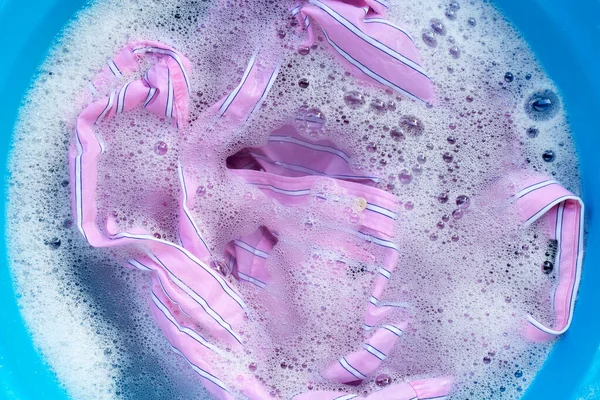 Pink Shirt Soak Powder Detergent Water Dissolution Washing Cloth Laundry — Stock Photo, Image