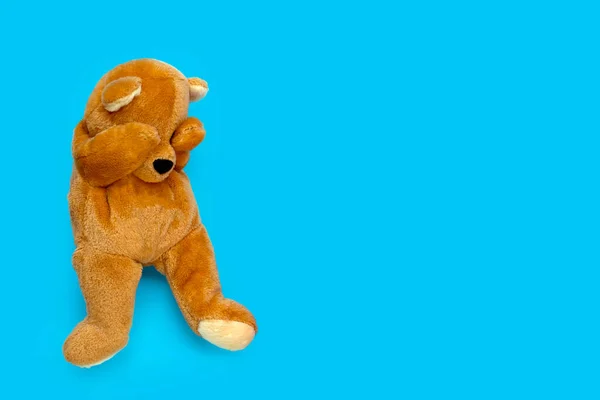 Lonely Sad Teddy Bear Blue Background Copy Space Royalty Free Stock Photos