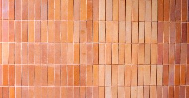 Arkaplan için sarı kahverengi tuğla duvar.