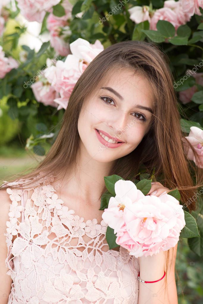 girl and roses, portrait of a girl in a rose garden, roses