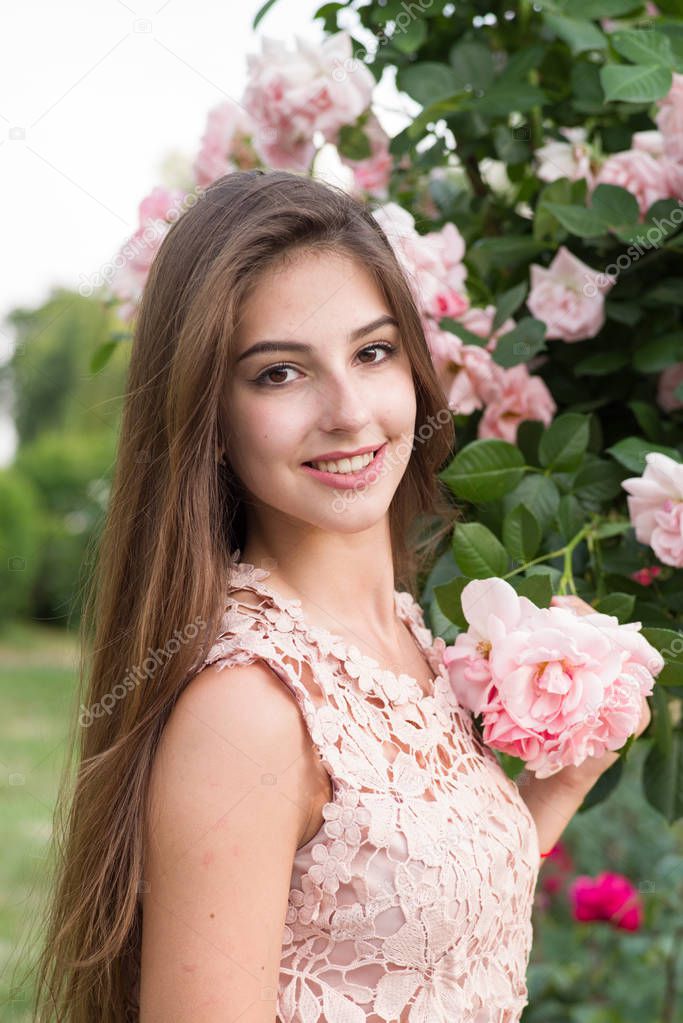 girl and roses, portrait of a girl in a rose garden, roses
