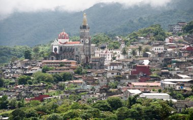 Cuetzalan del Progreso, Puebla, Mexico - 2019: Panoramic view of the city, including the Parroquia de San Francisco de Ass church.
