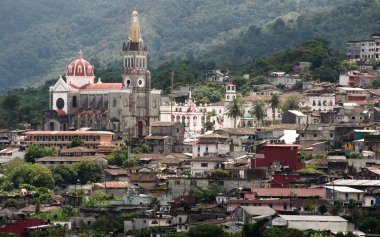 Cuetzalan del Progreso, Puebla, Mexico - 2019: Panoramic view of the city, including the Parroquia de San Francisco de Ass church.
