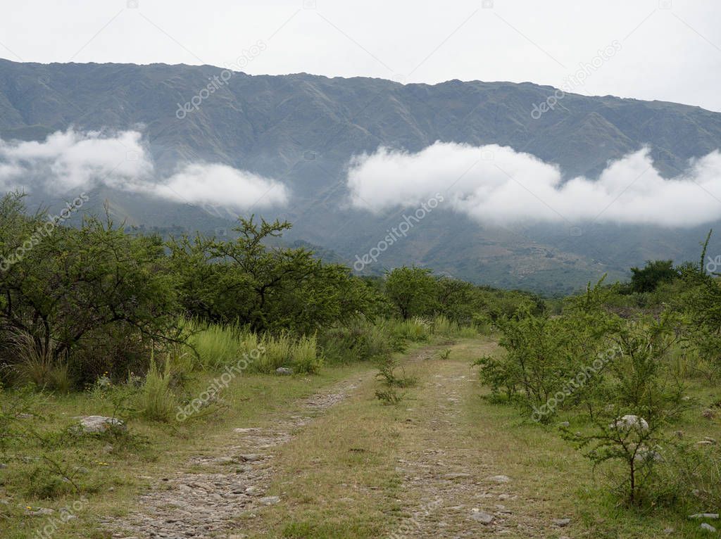 View of the Comechingones mountains covered in clouds in Villa de Merlo, San Luis, Argentina.